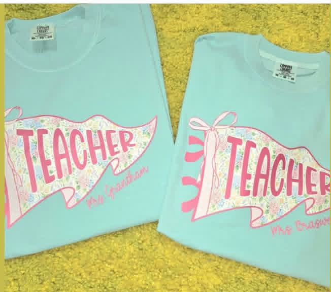 Mint teacher shirts with pink floral megaphone graphics and personalized teacher names