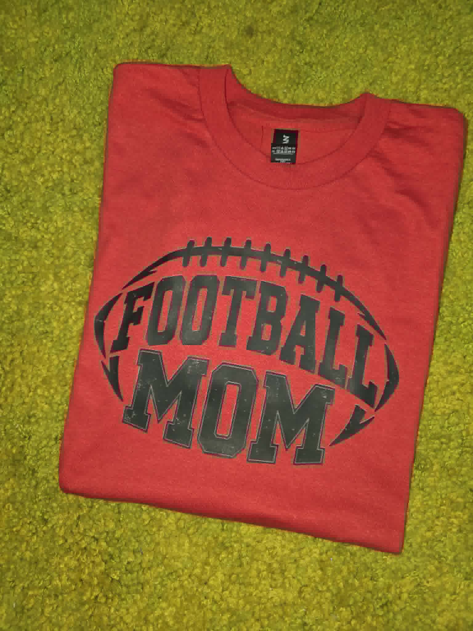Red Football Mom shirt with distressed black football graphic