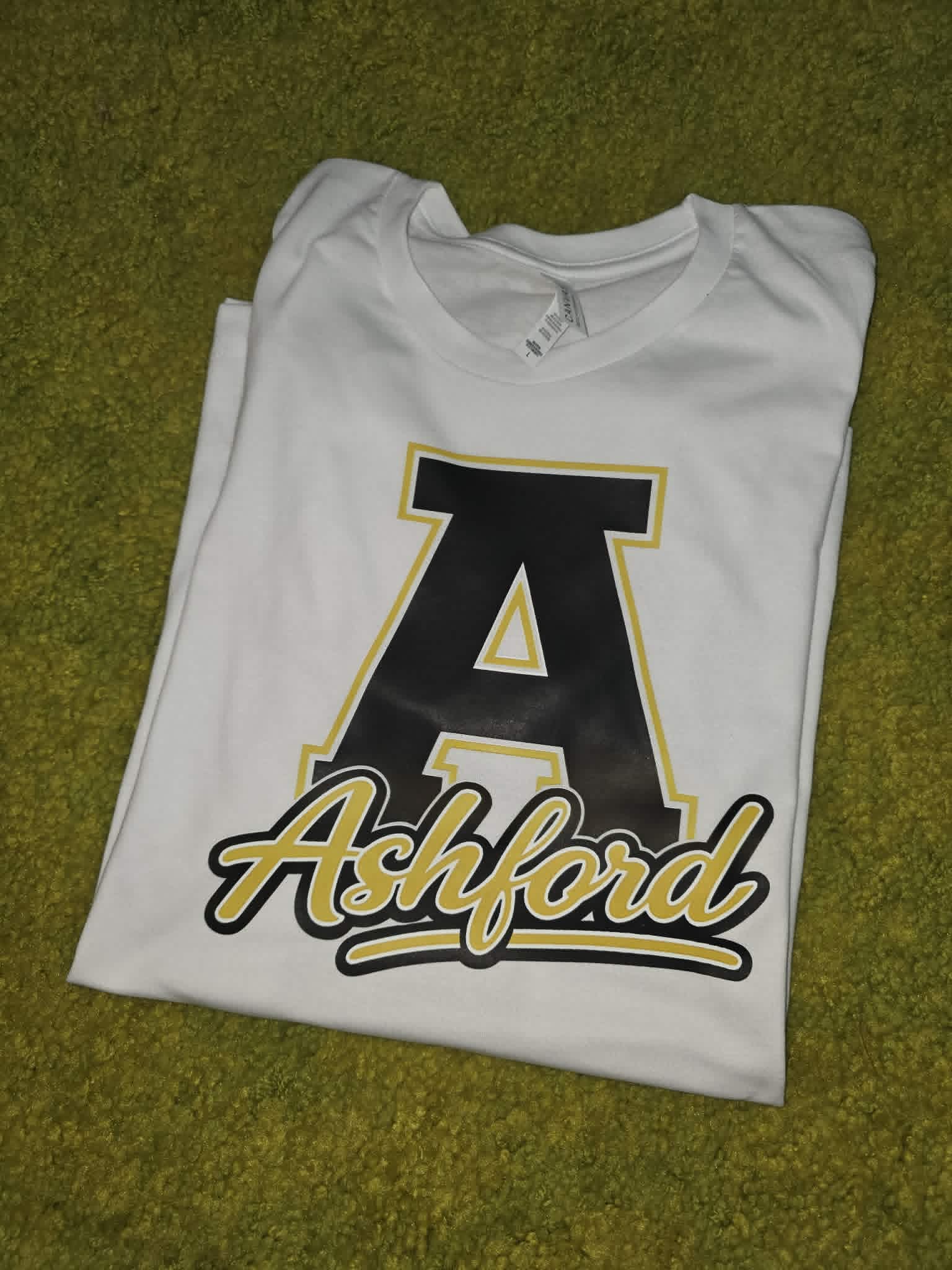 White Ashford shirt with large black and gold varsity letter A