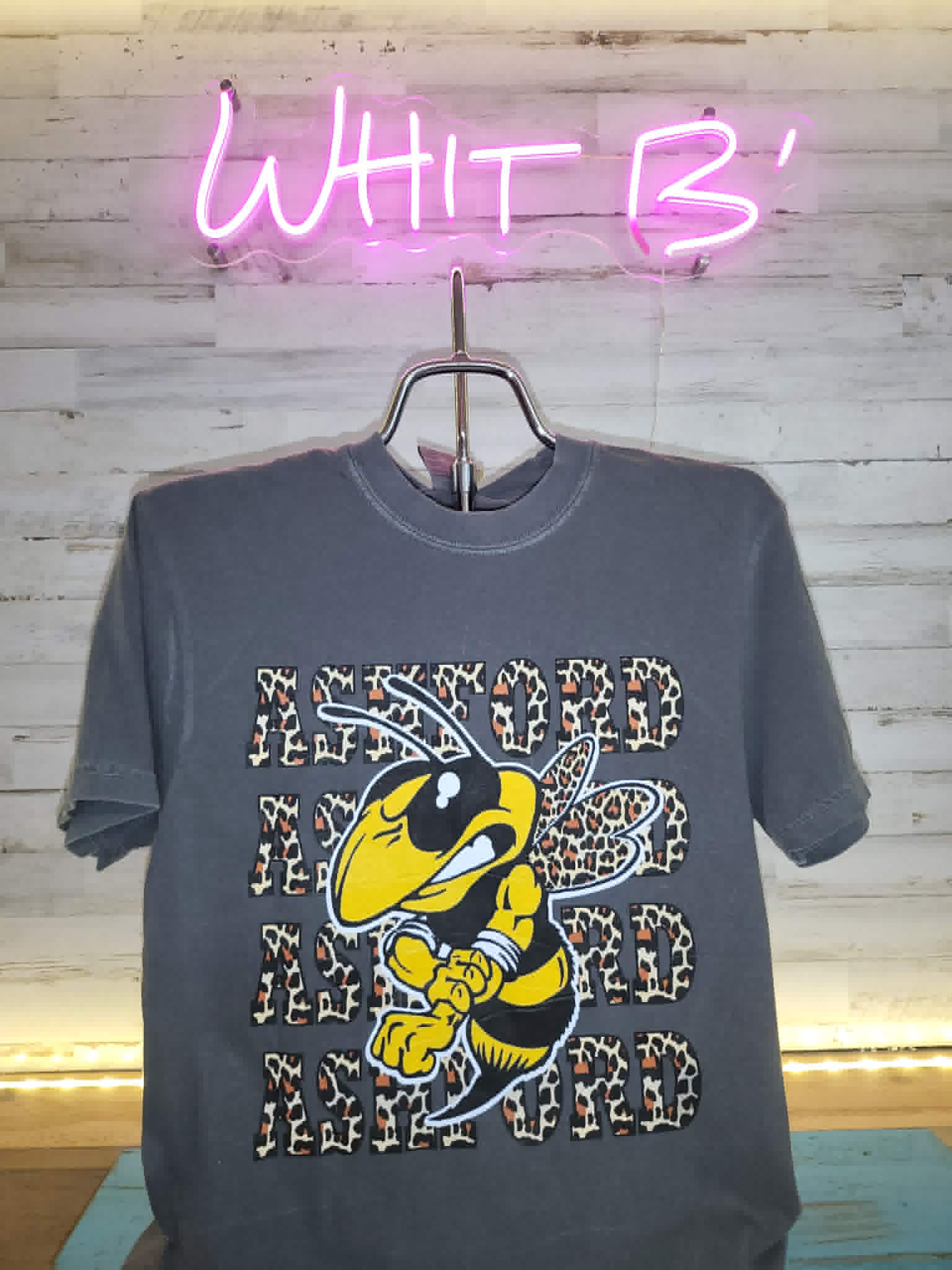 Dark gray Ashford shirt with leopard lettering and Yellow Jacket mascot