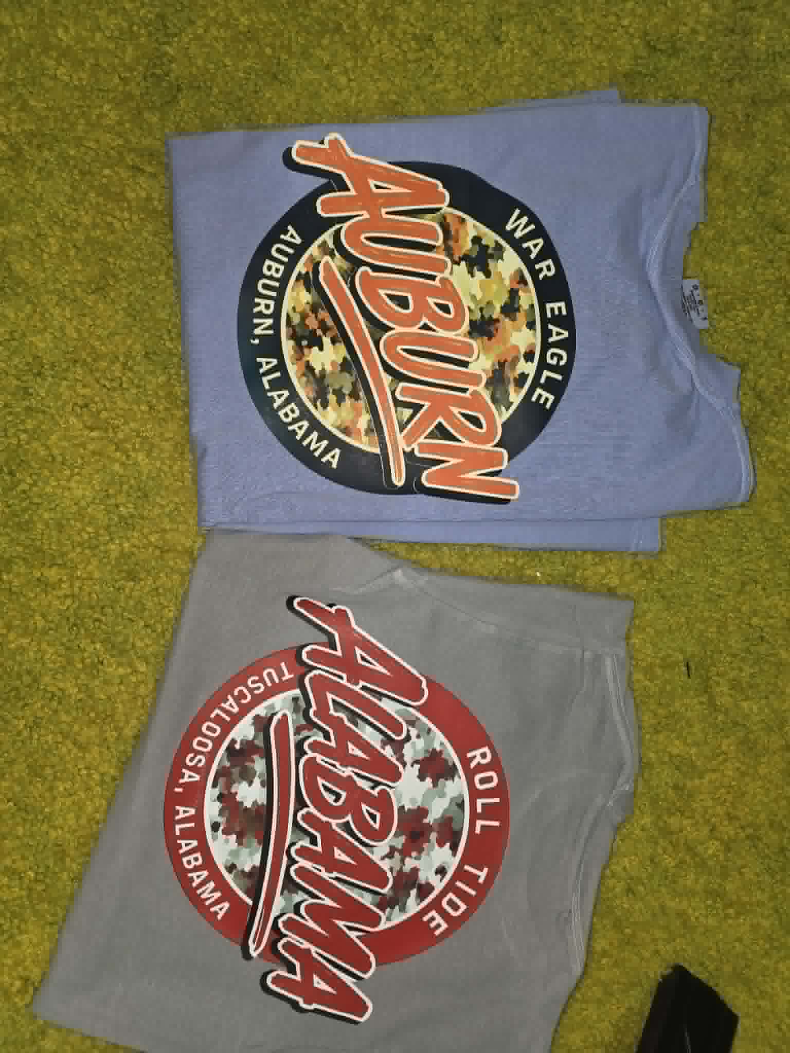 Auburn and Alabama shirts with round camouflage school graphics