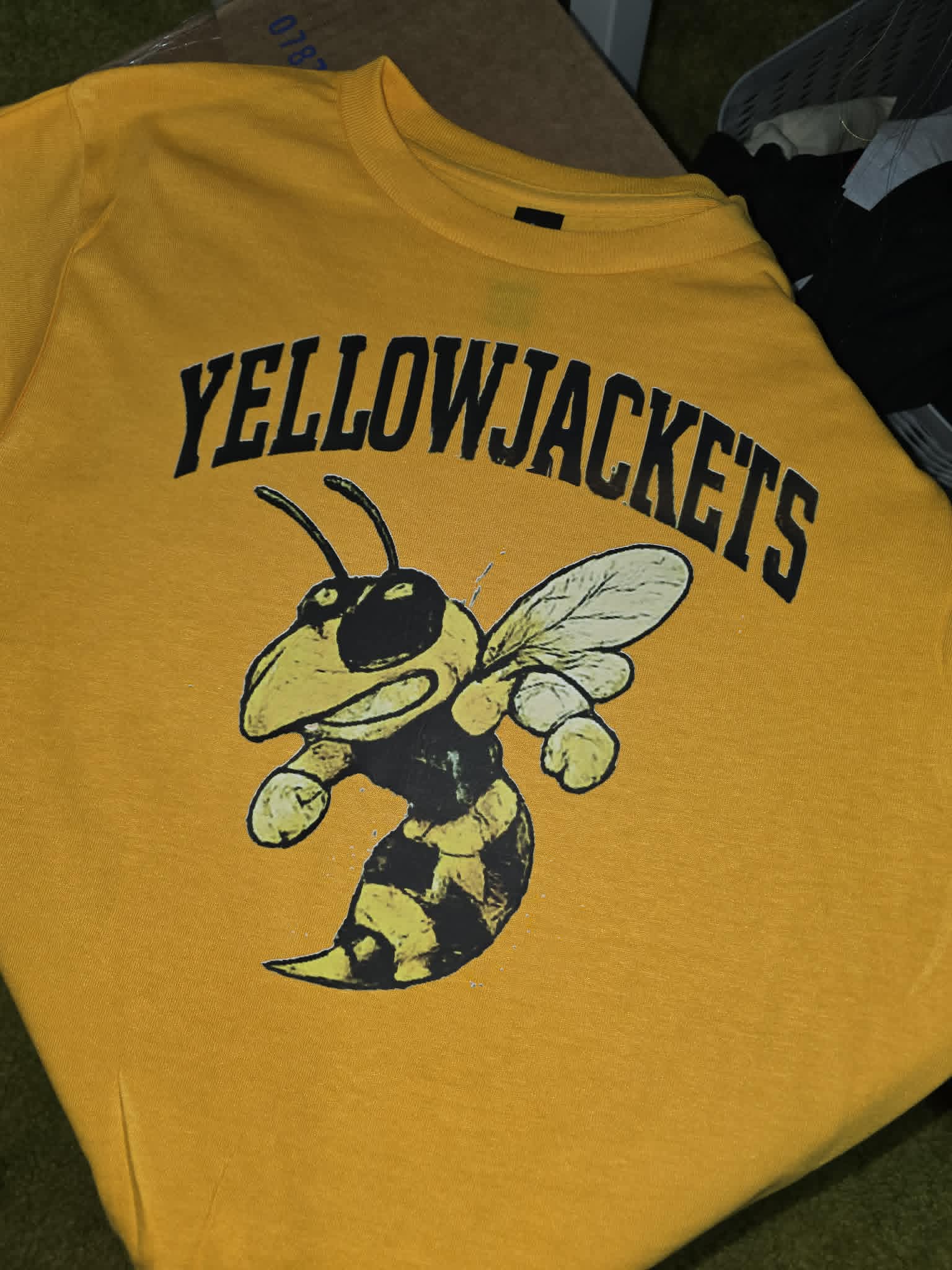 Gold Yellowjackets shirt with distressed vintage hornet mascot graphic