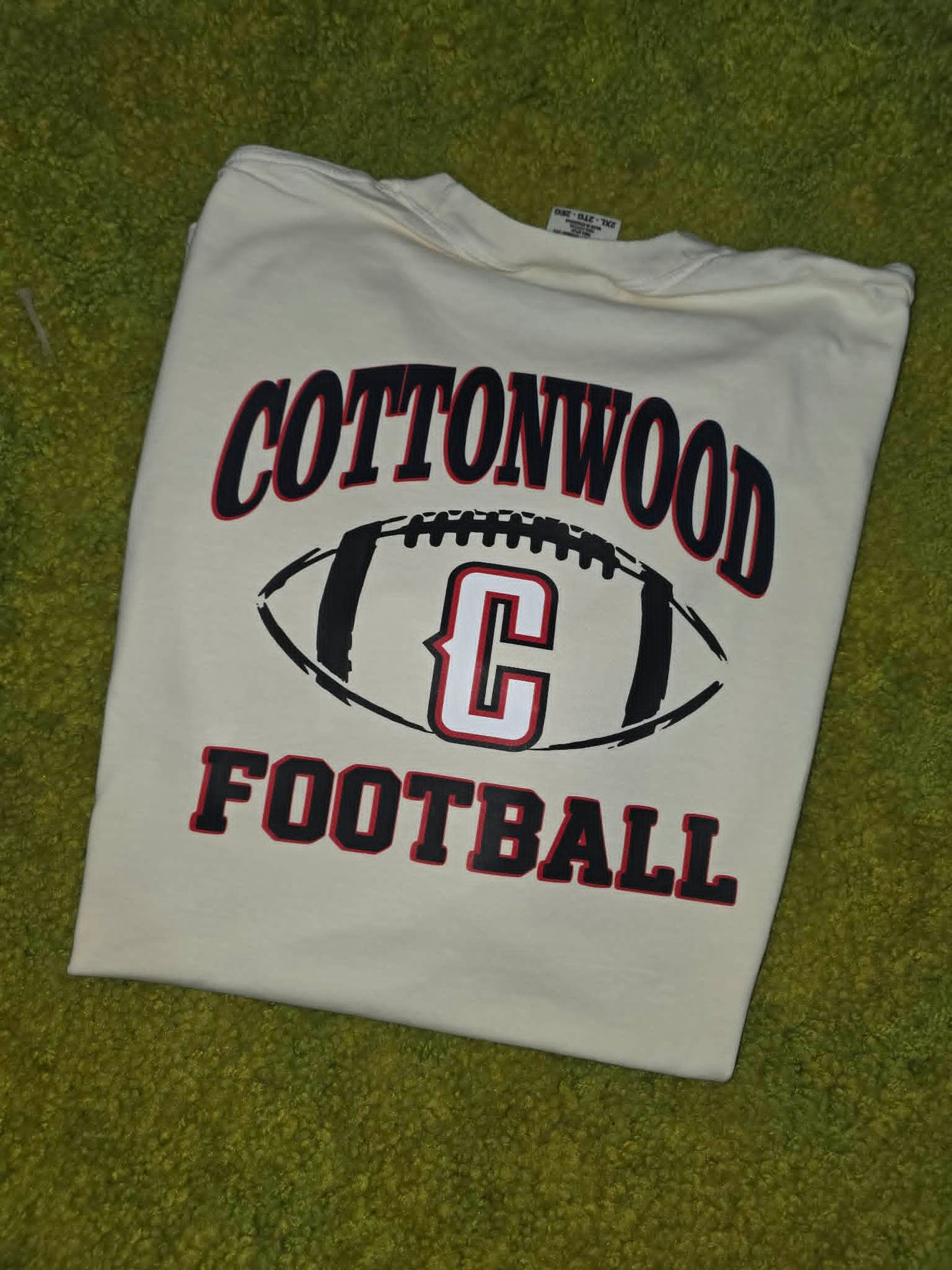 White Cottonwood football shirt with black and red lettering and C logo
