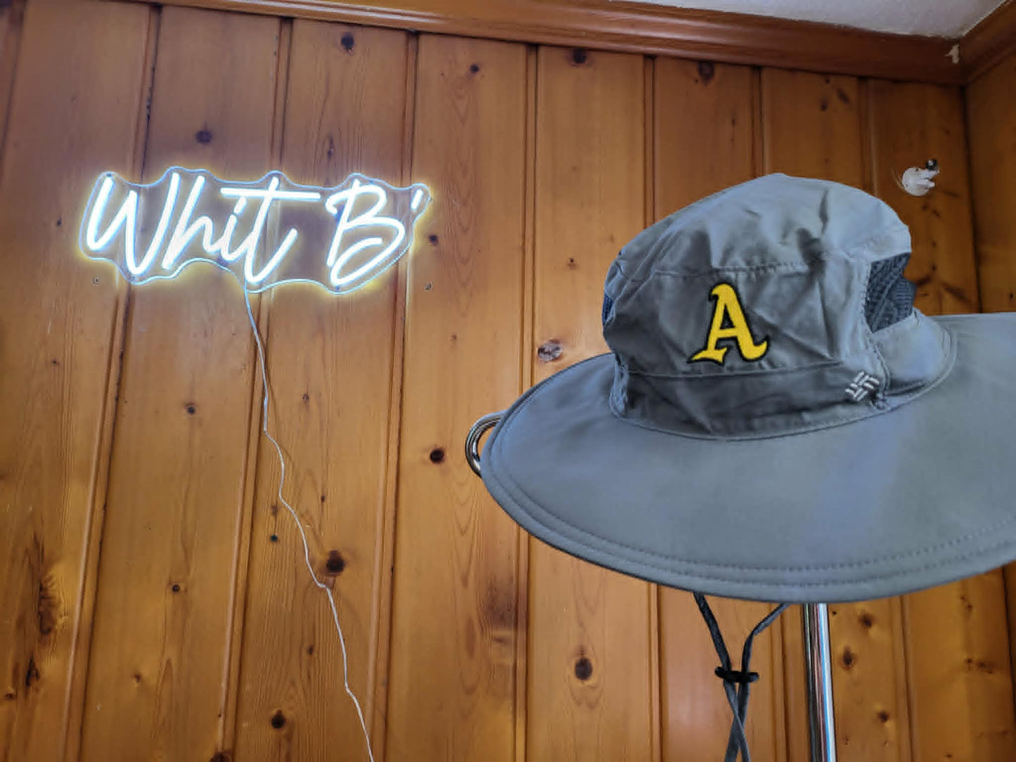 Gray wide-brim sun hat embroidered with a gold Ashford varsity A