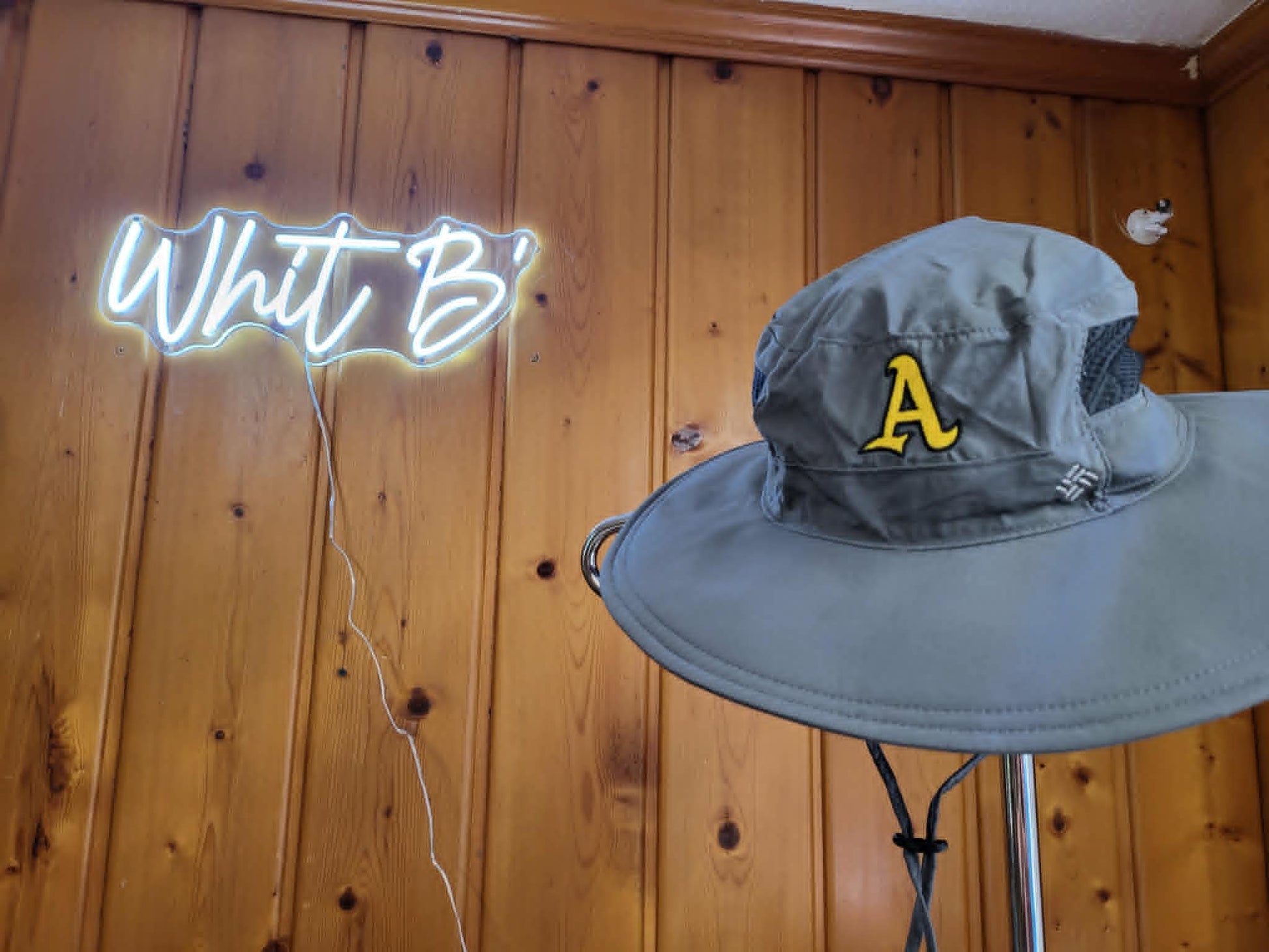 Gray wide-brim sun hat embroidered with a gold Ashford varsity A