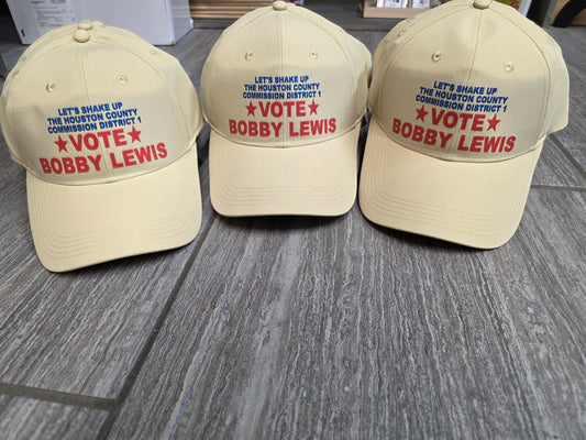 Tan campaign hats embroidered with Vote Bobby Lewis for Houston County Commission District 1